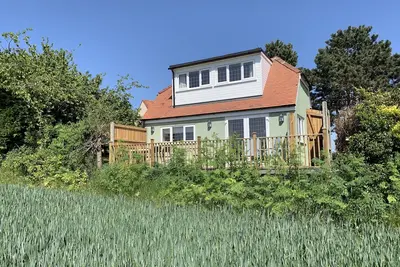Image de New lodge with stunning views. Close to country, city and coast.