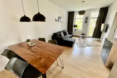 Image de Apartment mit 2 Schlafzimmern, Balkon, Netflix, Drucker und Privaten Parkplatz