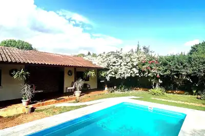 Resting cabin with a unique garden, swimming pool and Panamanian traditions.