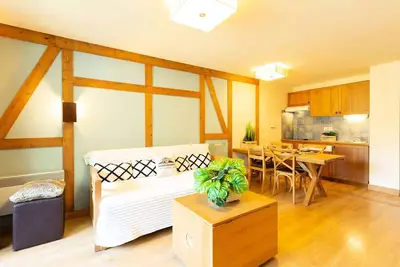 Appartement centre-ville avec piscine et sauna