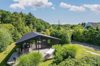 Image de Maison de vacances pour 6 a Glesborg-By Traum