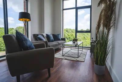 Image de Appartement en attiq-d'exception-Salle de bain privée séparée-Vue ville