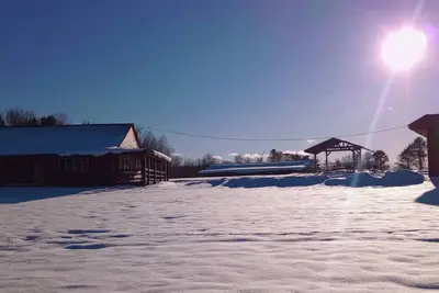 Image de Woodys Retreat  this rental includes the barn outdoor covered fire pit