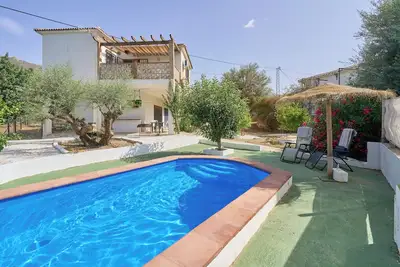 Image de Maison de vacances 'Casa Domi' avec vue sur les montagnes, piscine et Wi-Fi.