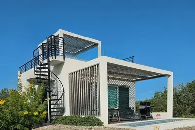Image de Private Pool Villa | Walk to Sapodilla Bay | Stunning Chalk Sound Views