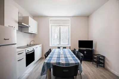 Image de Appartement \"Levico Al Corso Apartments\" Avec vue sur les montagnes