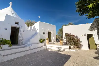 Image de Villa 'Trullo Syconium e Lamia Gea' avec piscine, terrasses et Wi-Fi