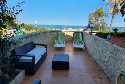 Image de Maison de vacances 'Urbanización Aldea Beach' avec vue sur la mer, piscine partagée et Wi-Fi.