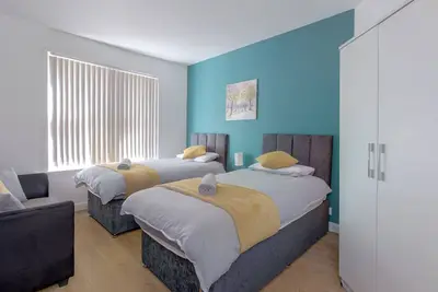 Image de Modern 4 Bedroom Home with Superfast Wifi