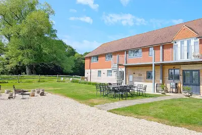 Image de A country house that sleeps 18 guests in 7 bedrooms