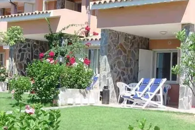 Image de Appartement de vacances Villasimius pour 1 - 5 personnes avec 1 chambre à coucher - Maison mitoyenne
