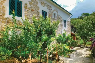 Image de Maison de vacances Supetarska Draga pour 1 - 6 personnes avec 3 chambres à coucher - Maison jumelée