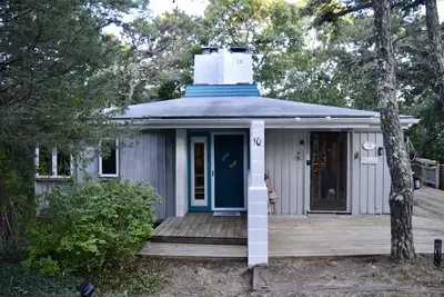 Mid Century 3 bedroom house in private wooded setting. . .