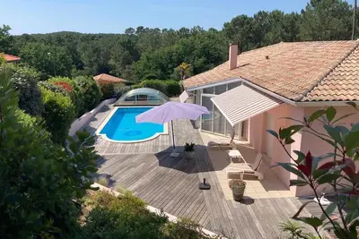 Image de Maison du golf proche du lac de Biscarrosse avec piscine chauffée