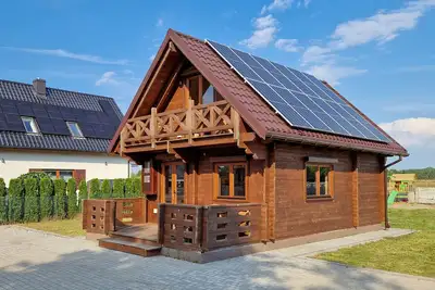 Image de A modern house with a large garden and a place for relaxation + fun for children