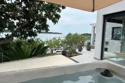 Image de Appartement de trois chambres prés de la plage Banjol, Rab (A-19752-a)