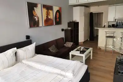 Modern 1-room apartment with balcony in a prime island location!