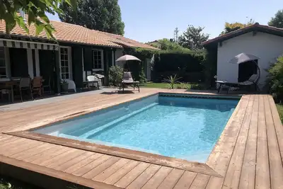 Image de Landaise rénovée au calme, piscine chauffée, climatisation