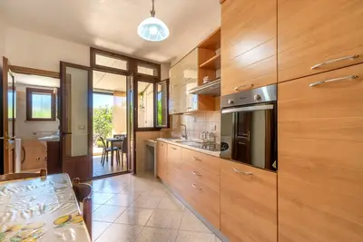 Image de Appartement \"Domus Lucia - Tredomus\" avec jardin et climatisation.