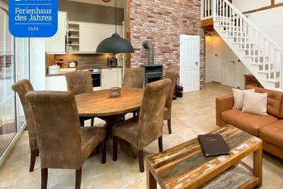 Image de Exclusive luxury vacation home right on the water with 5 stars in East Frisian Amb