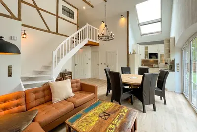 Image de Exclusive luxury vacation home right on the water with 5 stars in East Frisian Amb