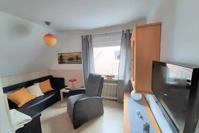 Image de Vacation apartment close to the beach in Norddeich, space for up to 4 people.
