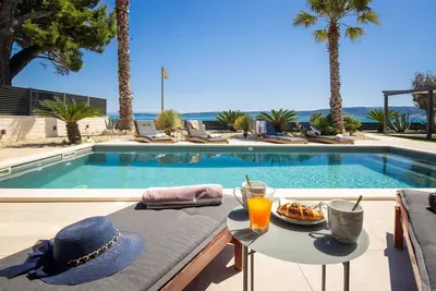Beachfront Villa Tota with Pool