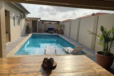 Image de Unique Aruban style house incl. swimming pool, outdoor kitchen, toilet & shower!