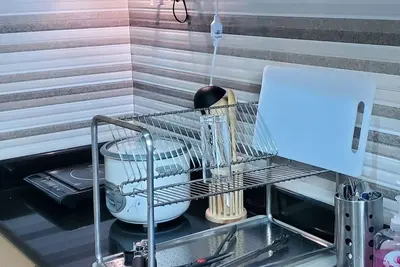 Image de New condo  with new furniture and appliances, 5 min walk to Sm, Trinoma