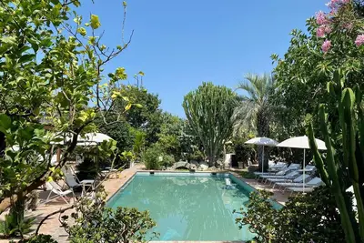 Image de \"Palm Cottage\" with garden, swimming pool and spa hot tub