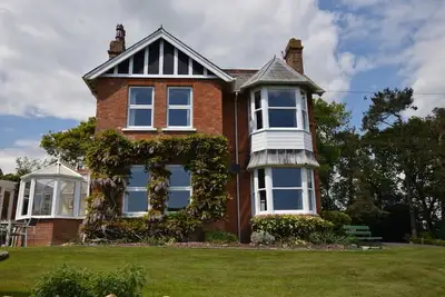 Image de Knowles - Sept Chambres Maison, Couchages 13