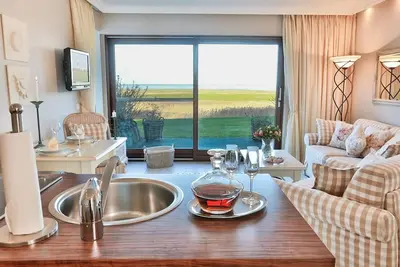 Image de Sylt Cottage - High-quality furnished vacation apartment with a panoramic view over the Morsum mudflats.