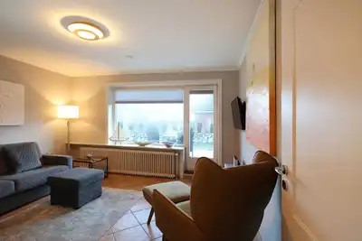 Image de Bright first floor apartment with terrace close to the beach in Westerland. -