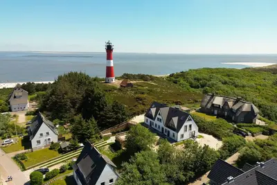 Image de Strandwächter - Luxuriöses Neubau Hausteil auf Einem Dünenkamm mit Blick zu Beiden Seeseiten