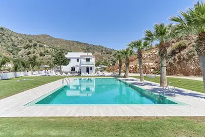 Image de Maison de vacances Era del Puerto 3 avec vue sur les montagnes, piscine partagée et Wi-Fi.