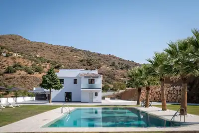 Image de Maison de vacances 'Era del Puerto 1' avec vue sur les montagnes, piscine, 2 balcons & Wi-Fi