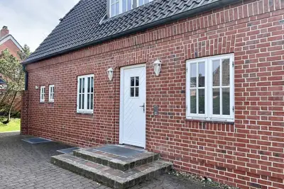Image de Min Hüs Og - Apartment close to the beach for 6 pers. with sauna, terrace, Wlan. Pets