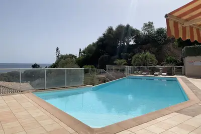 Image de Jolie maison 6-8 pers. dans petite résidence avec piscine à débordement vue mer