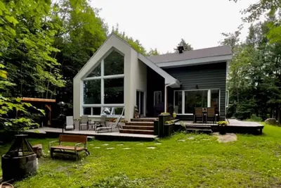 Image de Bord du Lac Chrétien ( rénové 2021/22) Chalet 5 étoiles