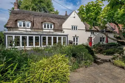 Image de 5 chambres à coucher à Ludham
