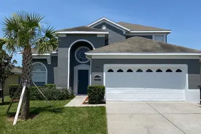 Image de Modern, beach themed newly remodeled 6 bedroom home, only 3 miles from Disney!