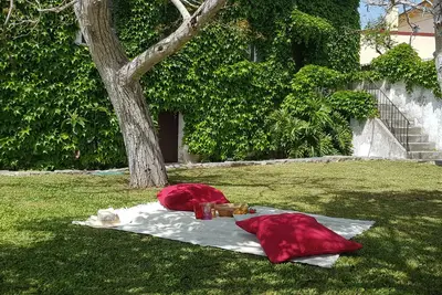 Image de Centenary house with garden and barbecue! Close to the beach and the city