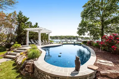 Image de Renovated dog-friendly bayfront home with private hot tub & pool, grill, & dock