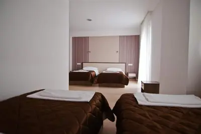 Image de Hotel Lux - Quadruple Room with Balcony