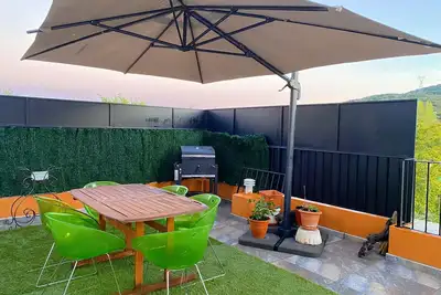 Image de Renovated town house with terrace.