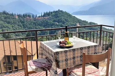 Charming Perledo Retreat with Lake View, Balcony & Parking