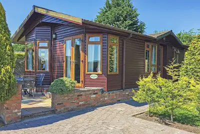 Image de Spacious lodge with one double with en suite shower and one twin.