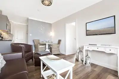 Image de SyltMomente - 2-room apartment close to the beach: balcony, parking space, Wlan. Pets