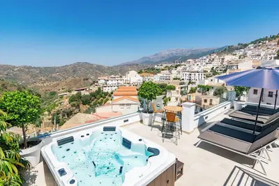 Image de Appartement moderne à Competa avec vue sur les montagnes, piscine partagée et Wi-Fi.