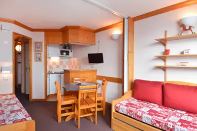 Image de Studio chaleureux au pied des pistes avec balcon